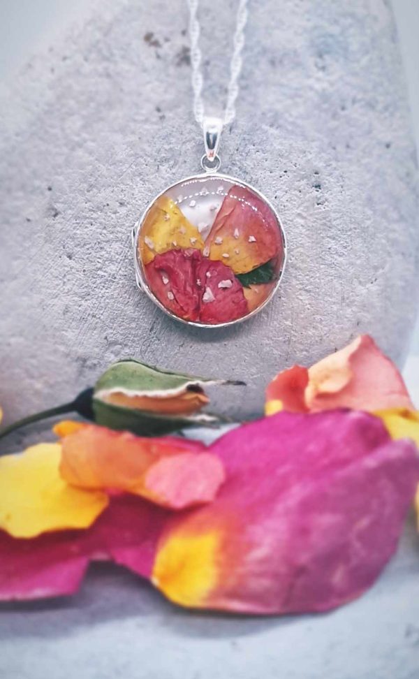 Memorial Locket with flowers of significance